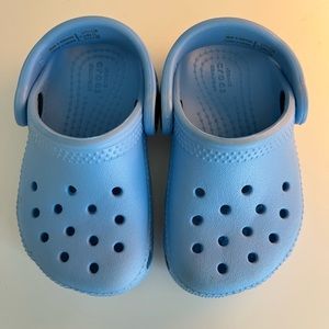 NWT sky blue CROCS size 5 toddler baby. Never worn